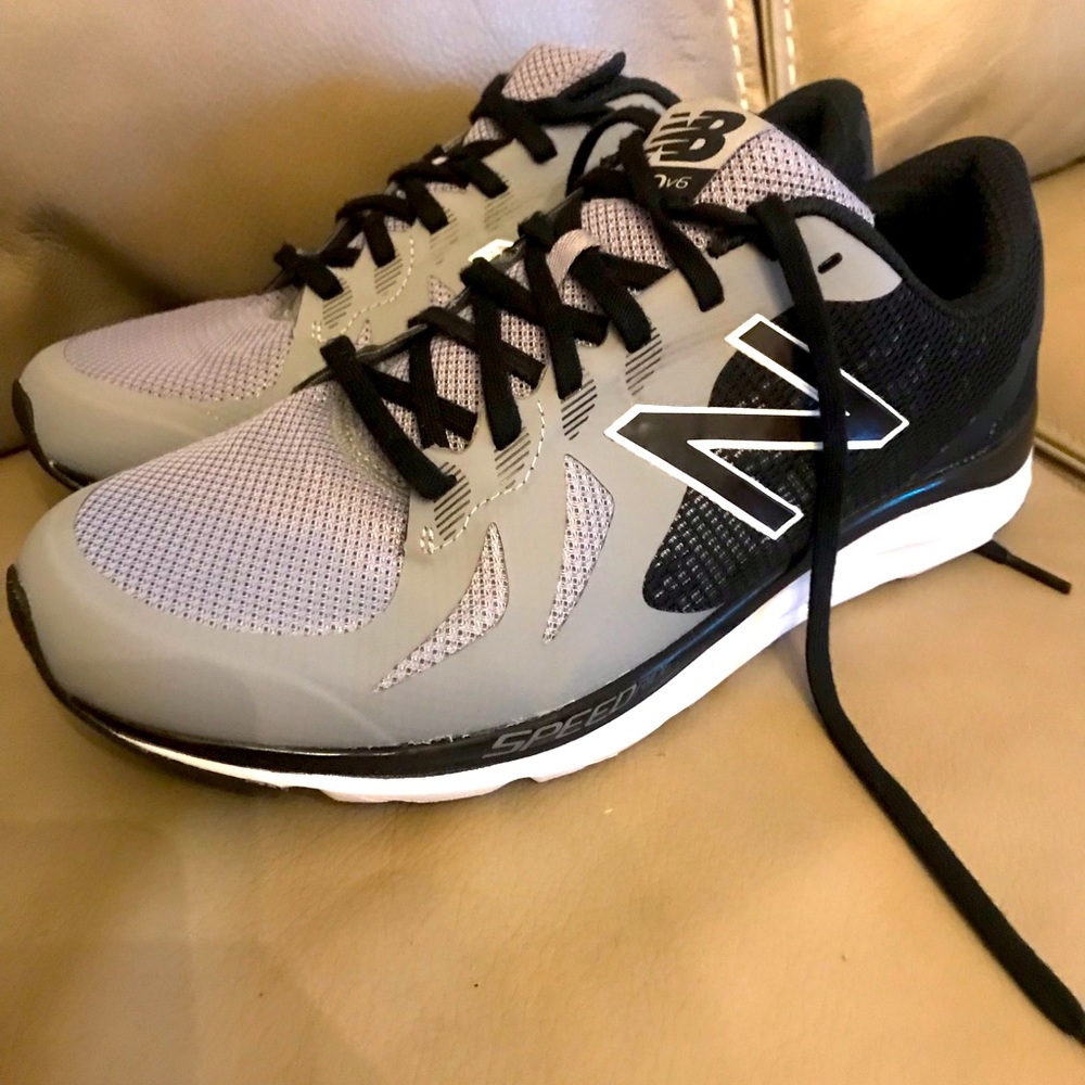 New Balance mens athletic shoes size 9